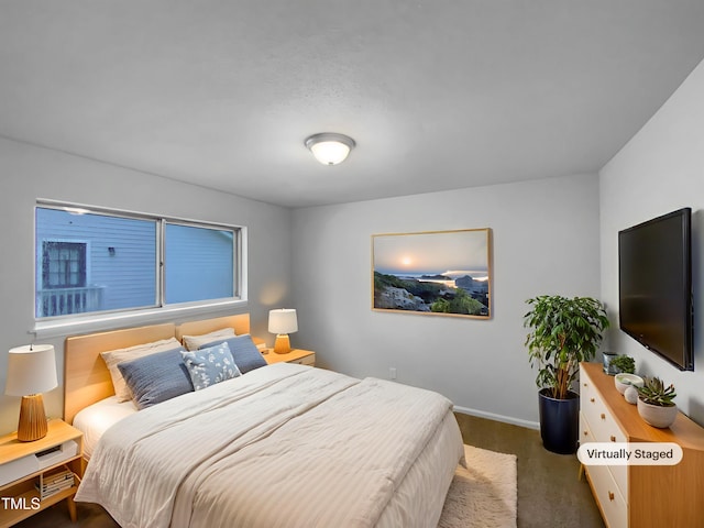 3721 Suffolk St, Durham, NC 27707 - carpeted bedroom featuring baseboards