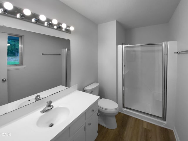 3721 Suffolk St, Durham, NC 27707 - full bathroom featuring wood finished floors, a stall shower, and vanity