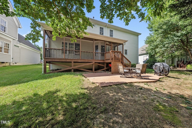 2027 River Grove Ln, Knightdale, NC 27545 - rear view of house featuring a sunroom, a yard, a patio area, and a deck