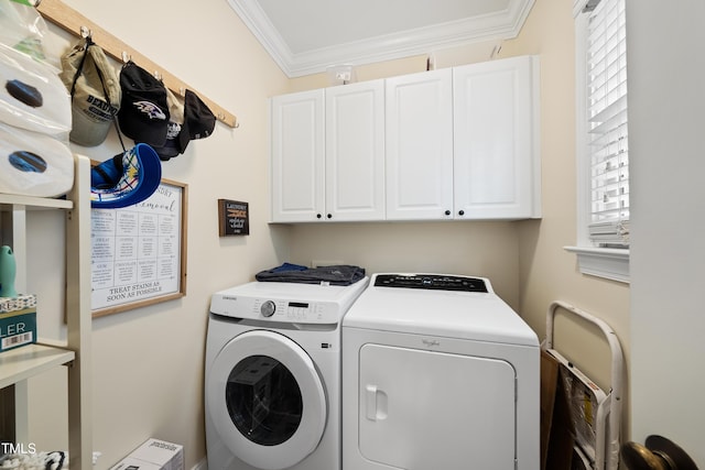 2027 River Grove Ln, Knightdale, NC 27545 - washroom featuring cabinet space, washer and clothes dryer, healthy amount of natural light, and crown molding