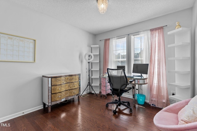 4505 Woodlawn Dr, Raleigh, NC 27616 - office area featuring wood finished floors and a textured ceiling