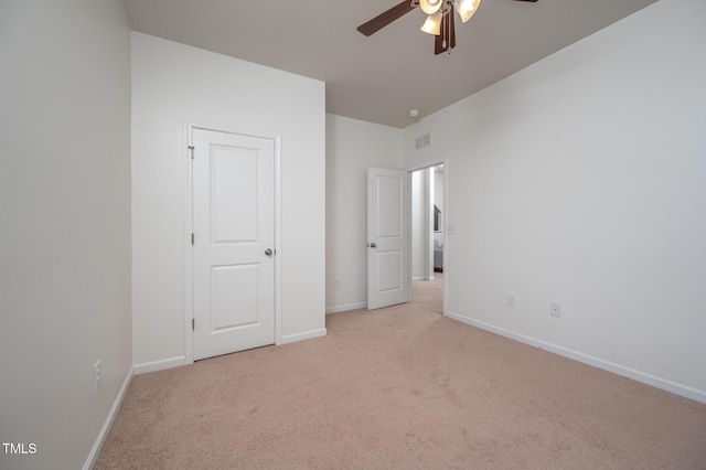 2007 October Dr, Durham, NC 27703 - unfurnished bedroom featuring light carpet and a ceiling fan