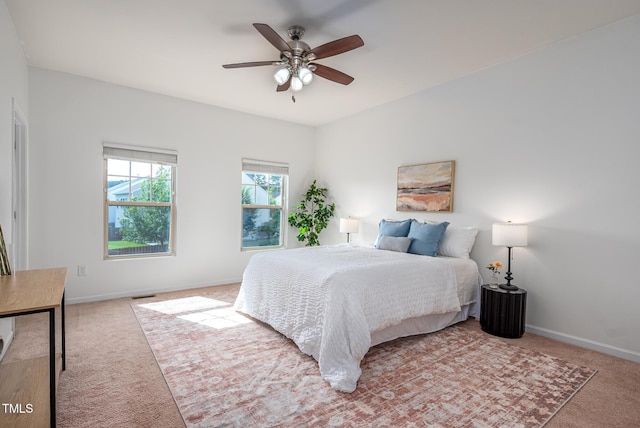 2007 October Dr, Durham, NC 27703 - bedroom with light colored carpet and a ceiling fan
