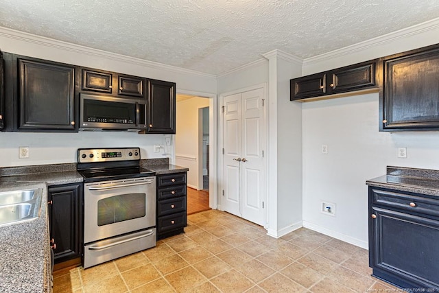 5228 Wallbrook Dr, Fayetteville, NC 28306 - kitchen with stainless steel appliances, dark countertops, a textured ceiling, crown molding, and light tile patterned floors