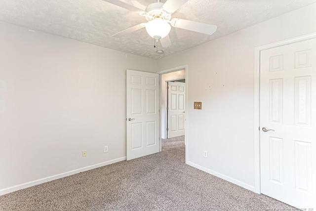 5228 Wallbrook Dr, Fayetteville, NC 28306 - unfurnished bedroom with carpet flooring, a textured ceiling, and ceiling fan