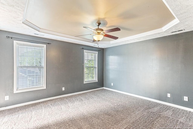 5228 Wallbrook Dr, Fayetteville, NC 28306 - carpeted empty room featuring a tray ceiling, ceiling fan, and ornamental molding