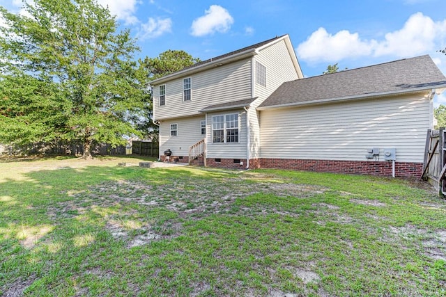 5228 Wallbrook Dr, Fayetteville, NC 28306 - back of house featuring entry steps, a fenced backyard, and crawl space