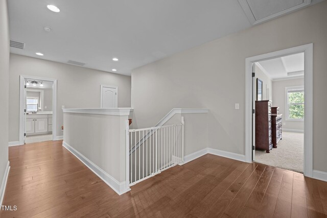 317 Striped Maple Ct, Apex, NC 27539 - hallway with an upstairs landing, wood-type flooring, and recessed lighting