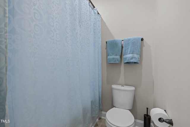 317 Striped Maple Ct, Apex, NC 27539 - bathroom featuring curtained shower and tile patterned floors