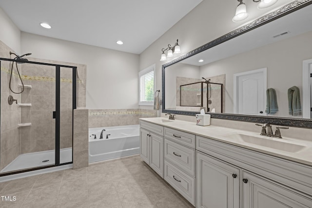 317 Striped Maple Ct, Apex, NC 27539 - full bathroom featuring a stall shower, a garden tub, double vanity, tile patterned flooring, and recessed lighting