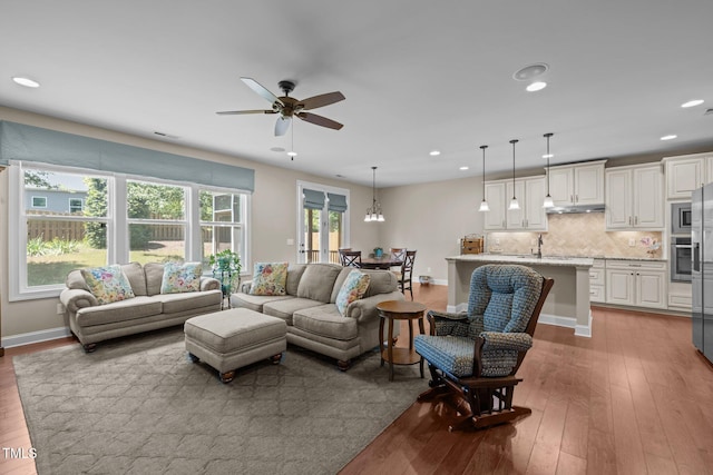 317 Striped Maple Ct, Apex, NC 27539 - living room with ceiling fan, wood-type flooring, and recessed lighting
