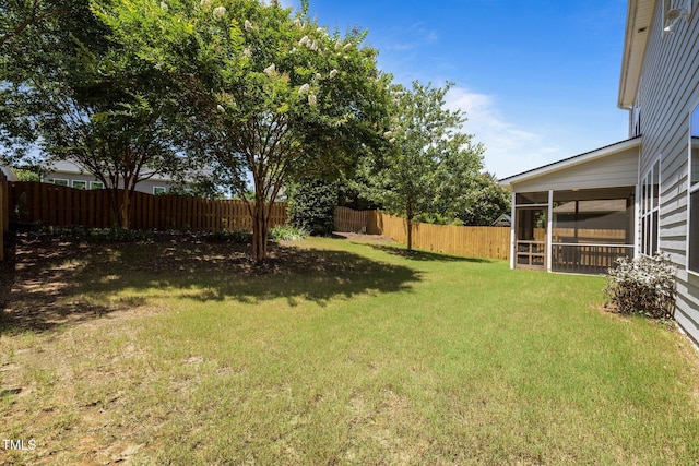 317 Striped Maple Ct, Apex, NC 27539 - fenced backyard featuring a sunroom
