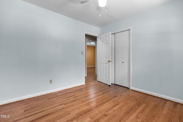 4404 Susan Dr, Raleigh, NC 27603 - unfurnished bedroom with light wood-type flooring, a closet, and a ceiling fan
