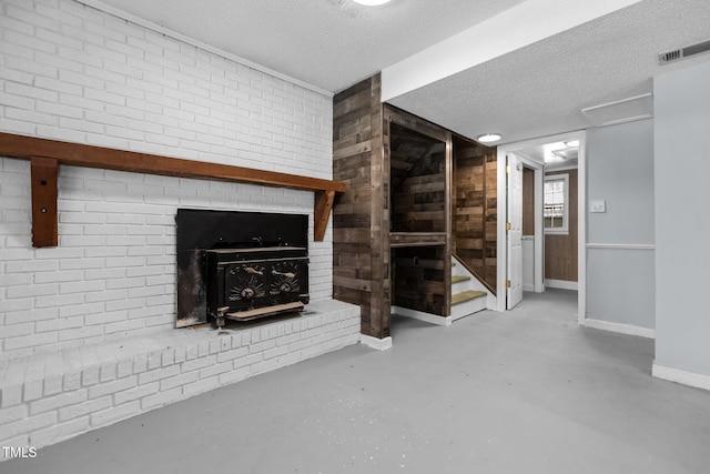 4404 Susan Dr, Raleigh, NC 27603 - unfurnished living room featuring a textured ceiling and concrete flooring