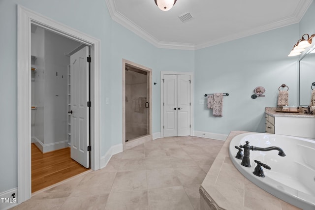 1028 Harpers Ridge Ct, Wake Forest, NC 27587 - full bathroom featuring ornamental molding, a closet, vanity, a garden tub, and a stall shower