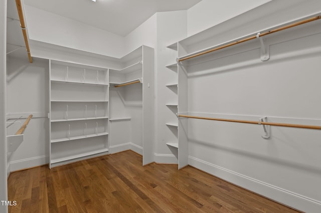 1028 Harpers Ridge Ct, Wake Forest, NC 27587 - walk in closet with wood finished floors