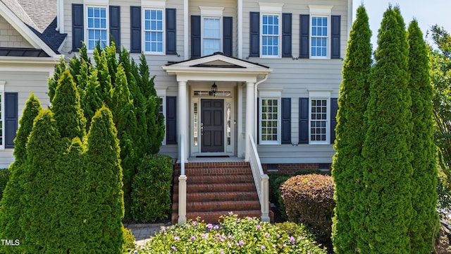 307 Beacon Falls Ct, Cary, NC 27519 - doorway to property with a standing seam roof