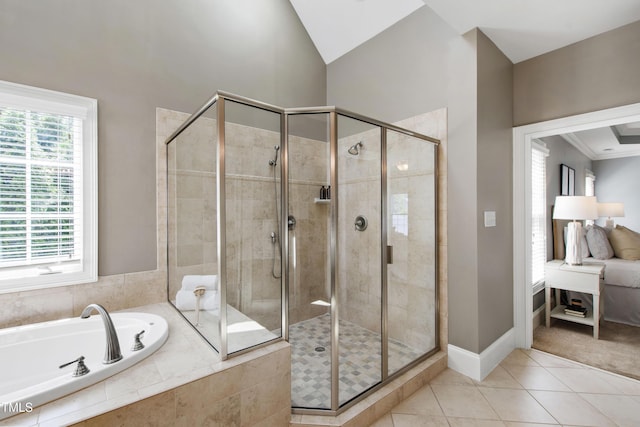 307 Beacon Falls Ct, Cary, NC 27519 - full bath featuring a bath, a stall shower, tile patterned floors, and vaulted ceiling