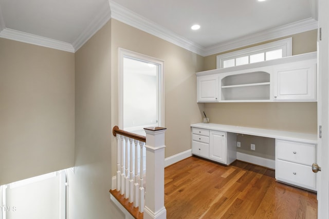 307 Beacon Falls Ct, Cary, NC 27519 - unfurnished office featuring built in desk, light wood finished floors, ornamental molding, and recessed lighting