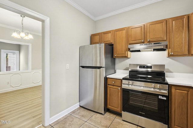 212 Cross Keys Ct, Cary, NC 27511 - kitchen with stainless steel appliances, under cabinet range hood, ornamental molding, light countertops, and a chandelier