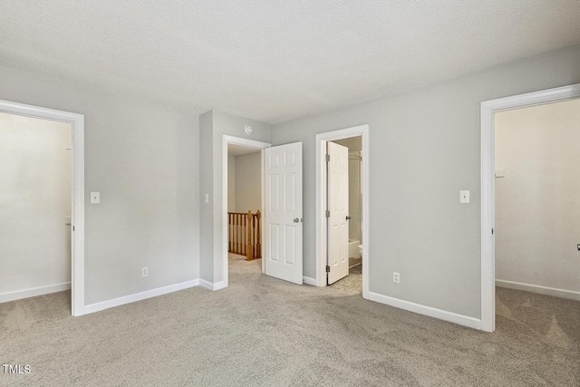 212 Cross Keys Ct, Cary, NC 27511 - unfurnished bedroom featuring a spacious closet, a closet, carpet flooring, and ensuite bath