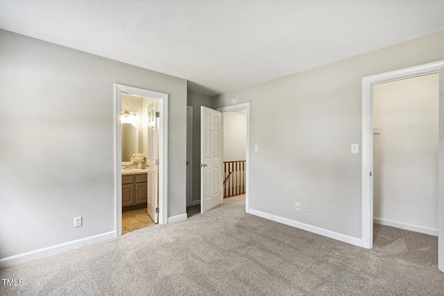 212 Cross Keys Ct, Cary, NC 27511 - unfurnished bedroom featuring carpet flooring, a spacious closet, and connected bathroom