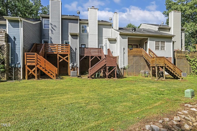 212 Cross Keys Ct, Cary, NC 27511 - back of house featuring stairs, a wooden deck, a lawn, and a chimney