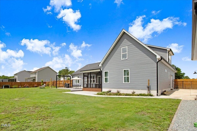 282 Brodie Rose Landing Way, Smithfield, NC 27577 - rear view of property with a patio area, a fenced backyard, and a sunroom