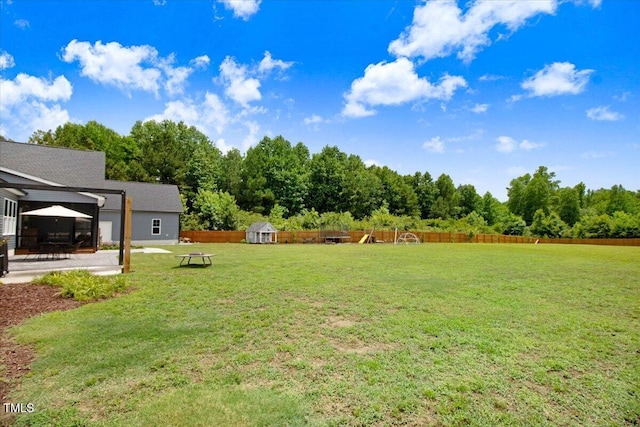 282 Brodie Rose Landing Way, Smithfield, NC 27577 - fenced backyard with a playground, a gazebo, and a patio