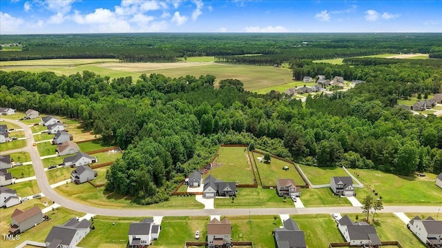 282 Brodie Rose Landing Way, Smithfield, NC 27577 - aerial perspective of suburban area featuring a forest