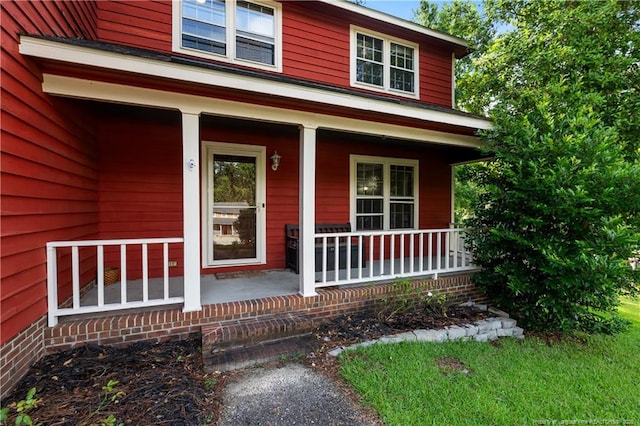 1612 Hennessy Pl, Fayetteville, NC 28303 - entrance to property with a porch