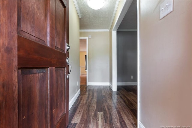 1612 Hennessy Pl, Fayetteville, NC 28303 - corridor with a textured ceiling, dark wood-type flooring, and crown molding