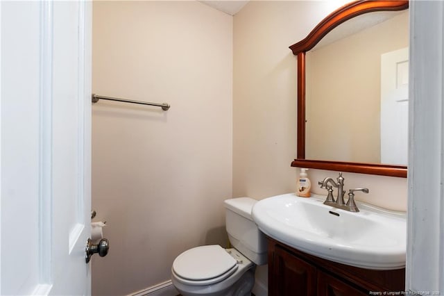 1612 Hennessy Pl, Fayetteville, NC 28303 - half bathroom featuring toilet and vanity