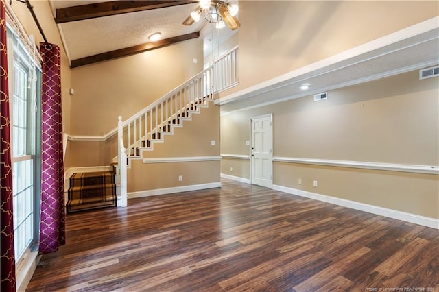 1612 Hennessy Pl, Fayetteville, NC 28303 - entrance foyer featuring ceiling fan, wood finished floors, stairway, high vaulted ceiling, and beamed ceiling