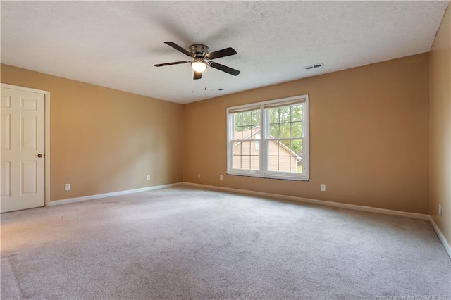 1612 Hennessy Pl, Fayetteville, NC 28303 - unfurnished room with a ceiling fan, carpet, and a textured ceiling