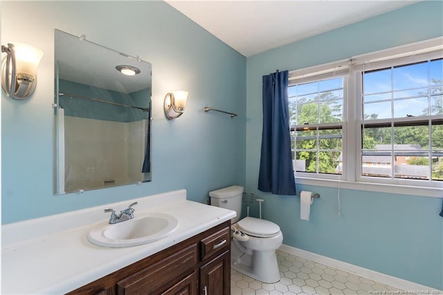 1612 Hennessy Pl, Fayetteville, NC 28303 - bathroom with vanity, a shower, and tile patterned flooring