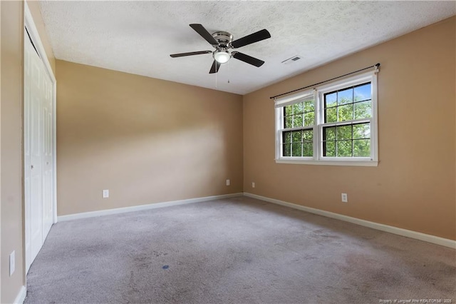 1612 Hennessy Pl, Fayetteville, NC 28303 - carpeted empty room with baseboards and ceiling fan