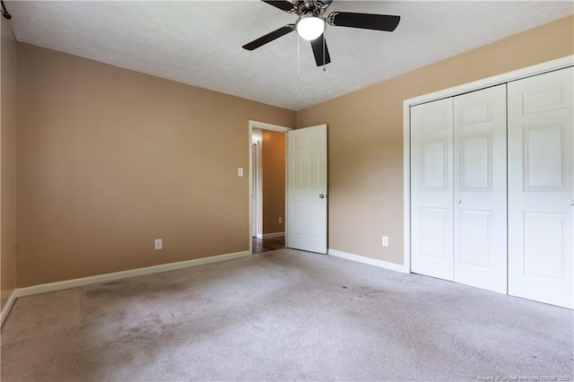 1612 Hennessy Pl, Fayetteville, NC 28303 - unfurnished bedroom with carpet flooring, a closet, and ceiling fan