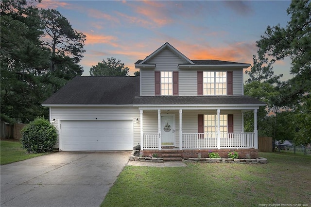 69 Ribbon Oak Ct, Sanford, NC 27332 - view of front of property with a porch, an attached garage, and concrete driveway