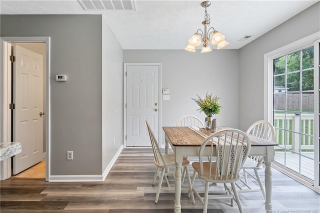 69 Ribbon Oak Ct, Sanford, NC 27332 - dining room with a chandelier and wood finished floors