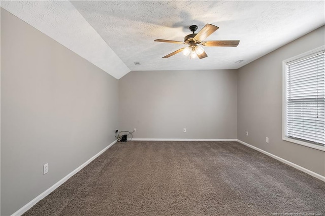 69 Ribbon Oak Ct, Sanford, NC 27332 - carpeted spare room with ceiling fan, a textured ceiling, and lofted ceiling