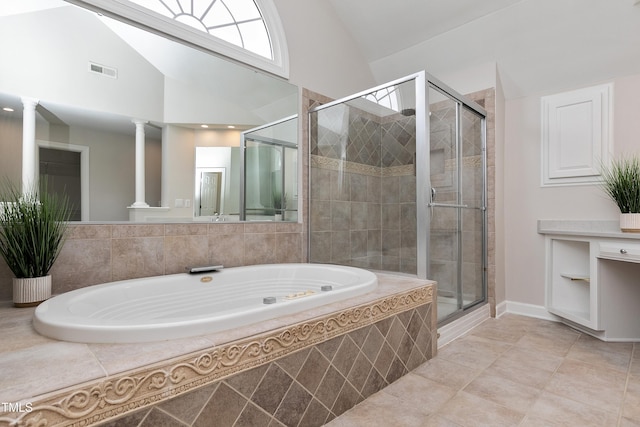 500 Walcott Way, Cary, NC 27519 - bathroom with decorative columns, a garden tub, a shower stall, high vaulted ceiling, and tile patterned floors