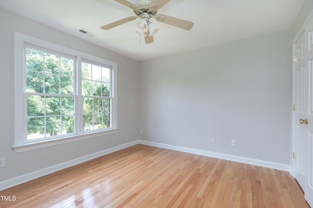 500 Walcott Way, Cary, NC 27519 - spare room featuring healthy amount of natural light, light wood-type flooring, and a ceiling fan