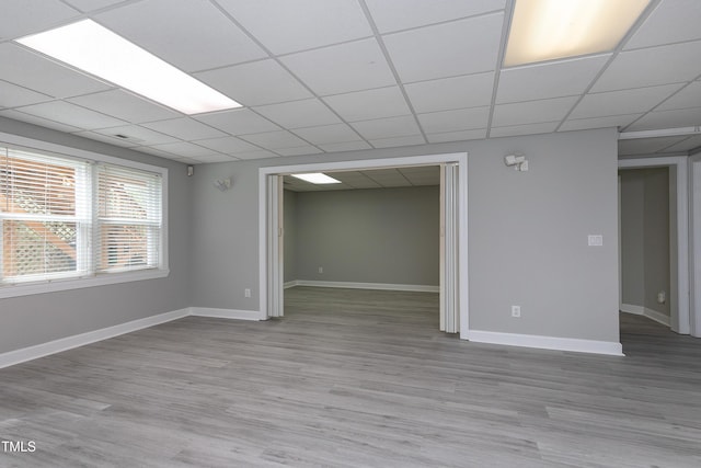 500 Walcott Way, Cary, NC 27519 - unfurnished room featuring a drop ceiling and light wood-style flooring