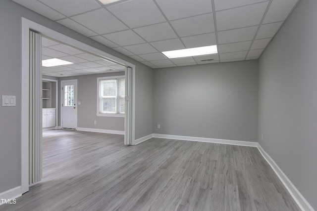 500 Walcott Way, Cary, NC 27519 - unfurnished room featuring wood finished floors and a drop ceiling