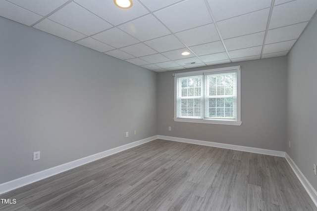 500 Walcott Way, Cary, NC 27519 - spare room with wood finished floors, a drop ceiling, and recessed lighting