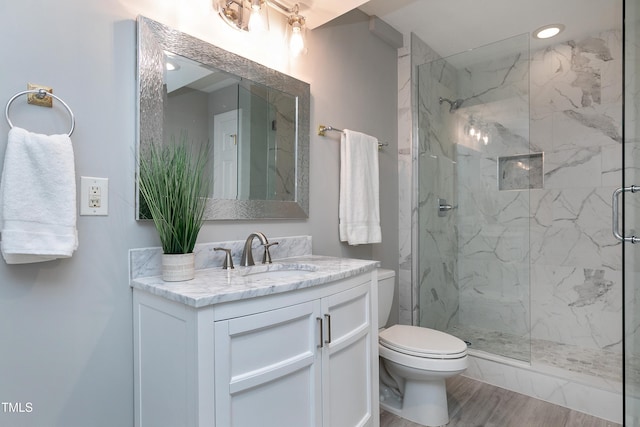 500 Walcott Way, Cary, NC 27519 - full bath featuring a marble finish shower, vanity, wood finished floors, and recessed lighting