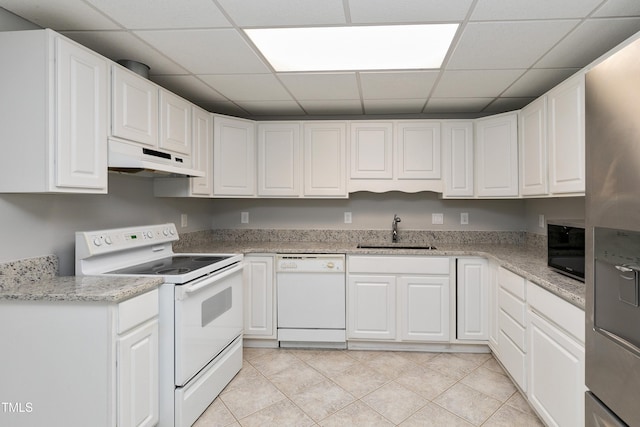 500 Walcott Way, Cary, NC 27519 - kitchen with white appliances, under cabinet range hood, a paneled ceiling, white cabinetry, and light tile patterned floors