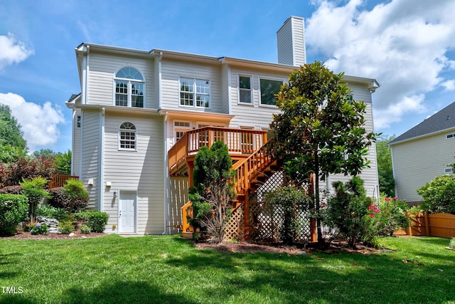 500 Walcott Way, Cary, NC 27519 - back of property with stairway, a wooden deck, a yard, and a chimney