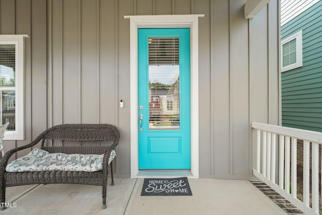 1006 Whistler St, Durham, NC 27713 - doorway to property with board and batten siding